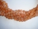 Show details for Peach Moonstone 5mm round Picture of Peach Moonstone 5mm round