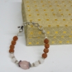 Picture of RoseQuartz & Rudraksha Beads Bracelet