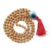 Picture of Rudraksha Mala mit facettiertem Trommelanhanger aus blauem Onyx