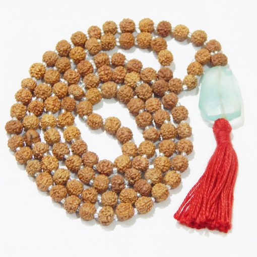 Picture of Rudraksha Mala mit facettiertem Trommelanhänger aus blauem Topas